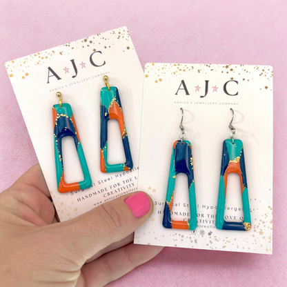 Turquoise Orange Navy and Gold Marbled Hollow Dangle